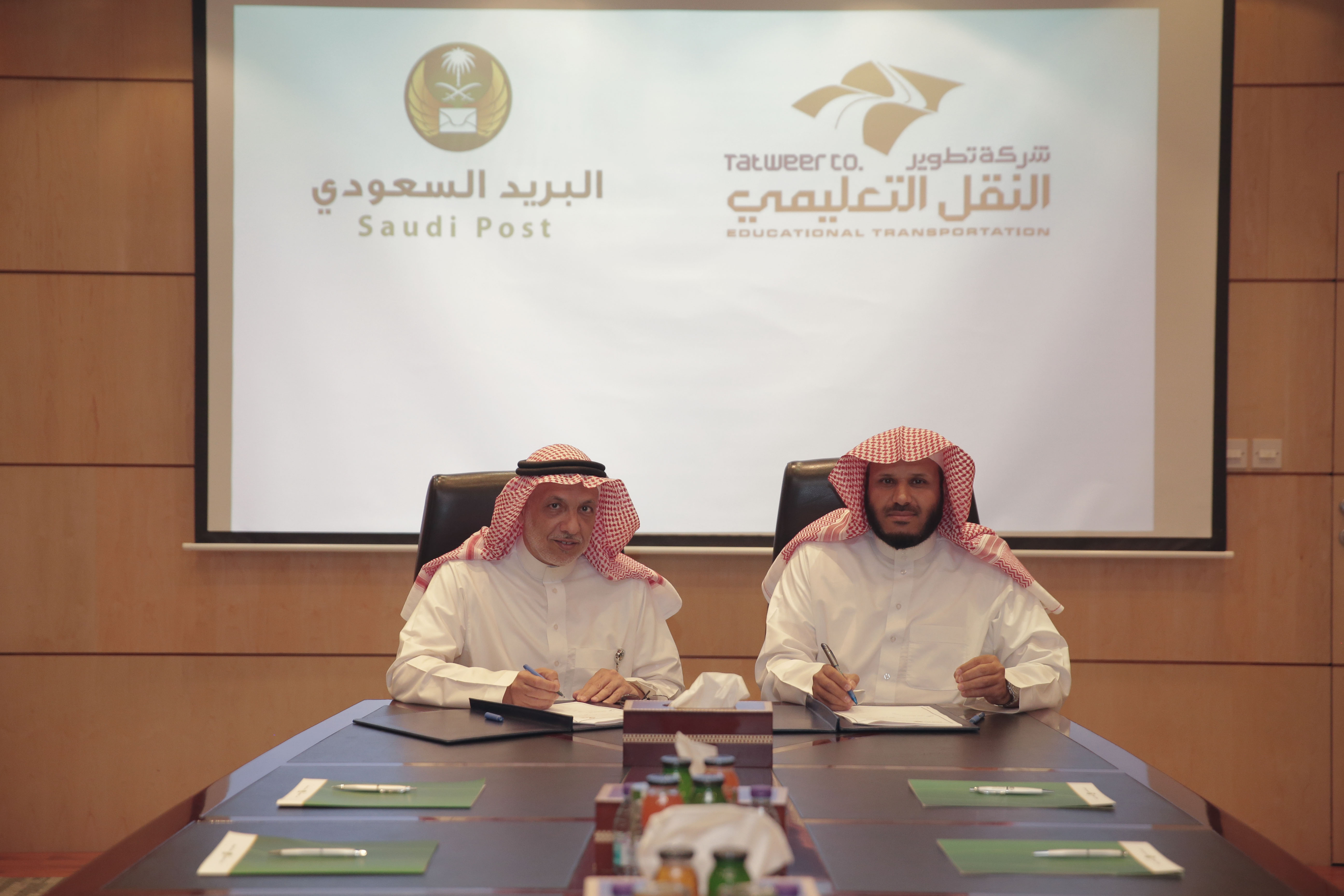  البريد السعودي يوقع اتفاقية مع شركة تطوير لخدمات النقل التعليمي